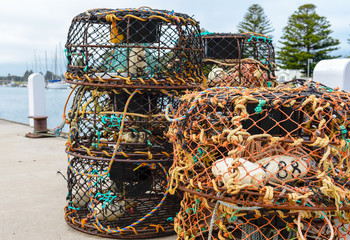 Empty lobster pots on the wharf at Port Fairy Victoria Australia