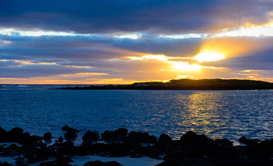 Sun on the horizon at the beach, Victoria Australia
