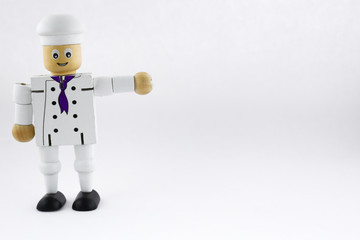 cook chef. wooden toy cook chef figure. isolated cook chef