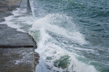 Seascape, view of sea waves along promenade