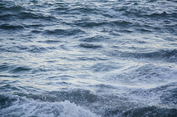 Seascape background of storm, white marine foam