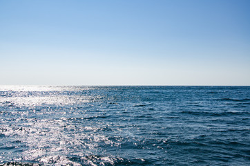 Naklejka na ściany i meble Seascape, view of sea horizon and blue sky