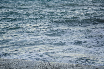 Seascape background of storm, white marine foam
