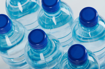 Group of blue plastic bottles