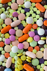 multi-colored tablets and pills