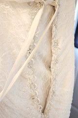 Back of a wedding dress with string and sparkle
