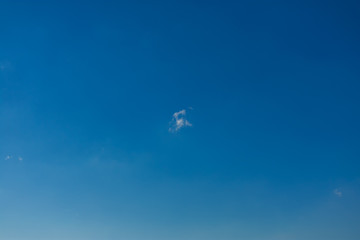 White cloud against blue sky. Single white cloud against a blue sky. White cloud blue sky.