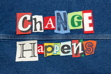Colorful CHANGE HAPPENS word collage from cut out tee shirt letters on denim, horizontal aspect