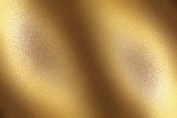 Brushed bronze metal foil surface, abstract texture background