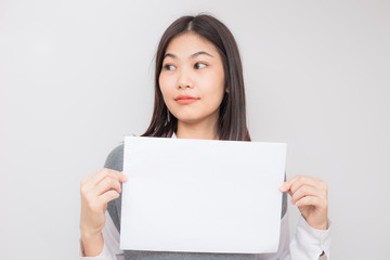 Fototapeta premium Smiling business asian women hold blank white paper ads text sapce