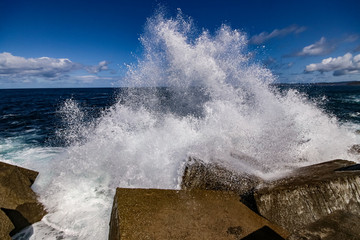 waves crashing on the port