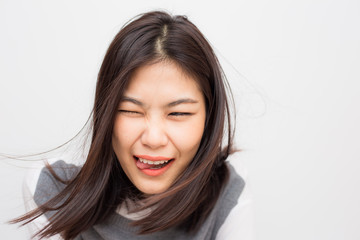 Beautiful short hair smiling asian women on white background