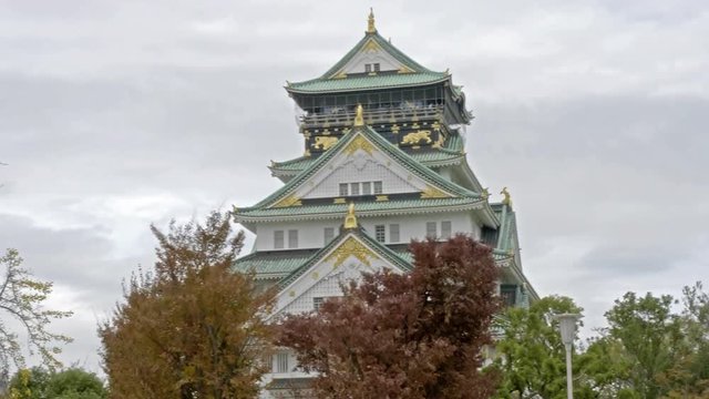 Osaka Castle Japan from 16th Century Landmark and Attraction View From Nishinomaru Garden With Trees and Skyline Panorama
