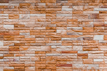Modern stone brick wall background.