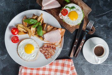 Fried eggs with bacon on plate