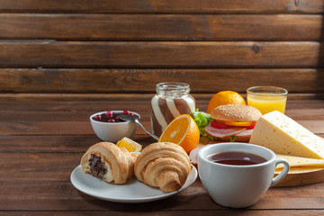 Breakfast with orange juise and croissant