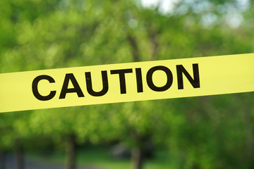 close up on caution on yellow stripe