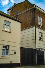 Fototapeta na wymiar London backyard of homes and mixed ones