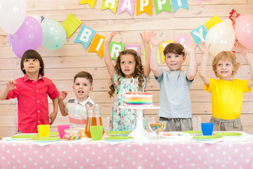 happy children boys and girls celebrating birthday holiday