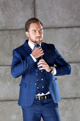 Obraz premium portrait of young handsome bearded man with perfect hair cut straighten clothesю ыгше фтв ешу