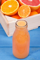 Fresh coctail or smoothie made of citrus fruits. Healthy dessert for diet and slimming