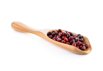 Red bean seeds In wood scoop on white background