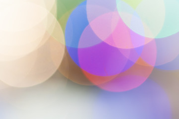 Colourful festive multi-colored circles . Defocused abstract multicolored bokeh lights background.
