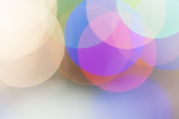 Colourful festive multi-colored circles . Defocused abstract multicolored bokeh lights background.