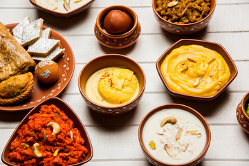 group of Indian Sweet / mithai in terracotta bowl