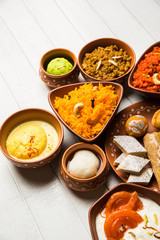 group of Indian Sweet / mithai in terracotta bowl