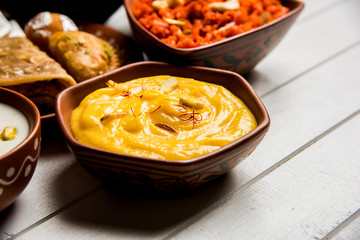 group of Indian Sweet / mithai in terracotta bowl