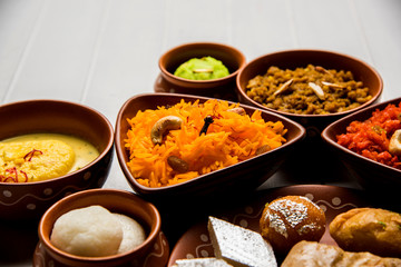 group of Indian Sweet / mithai in terracotta bowl