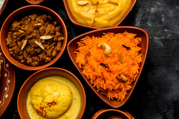 group of Indian Sweet / mithai in terracotta bowl