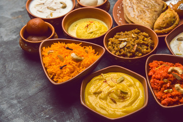 group of Indian Sweet / mithai in terracotta bowl