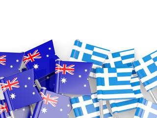 Pins with flags of Australia and greece isolated on white.
