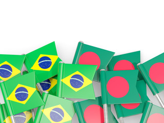 Pins with flags of Brazil and bangladesh isolated on white.