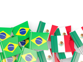 Pins with flags of Brazil and mexico isolated on white.
