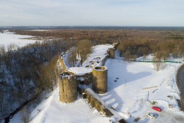 View of the ruins of the ancient fortress on a February afternoon (aerial photography). Koporye. Leningrad region, Russia