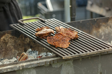 Grilled meat on the grill