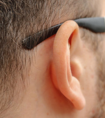 The ear on the head of a man