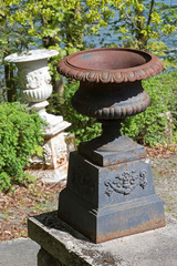 Antique Iron Flower Pots in the garden