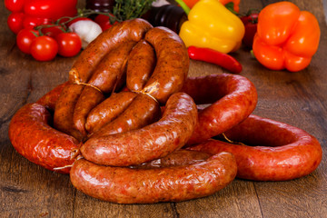 Pork sausages over wooden