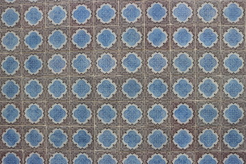 Azulejo is a form of Portuguese painted tin-glazed ceramic tilework.