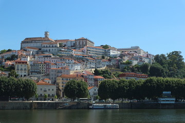 Naklejka na ściany i meble Coimbra is a city and a municipality in Portugal. The city, located on a hill by the Mondego River. Was called Aeminium in Roman times.