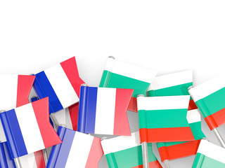Pins with flags of France and bulgaria isolated on white.