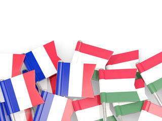 Fototapeta na wymiar Pins with flags of France and hungary isolated on white.
