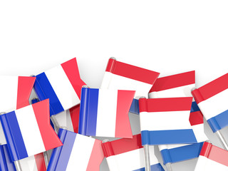Pins with flags of France and netherlands isolated on white.