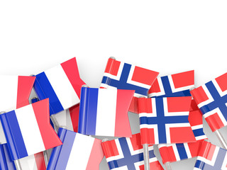 Pins with flags of France and norway isolated on white.