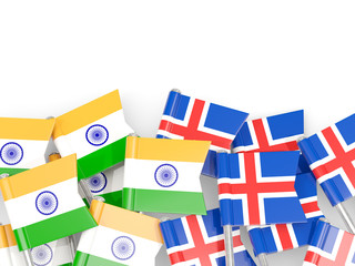 Pins with flags of India and iceland isolated on white.