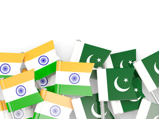 Pins with flags of India and pakistan isolated on white.